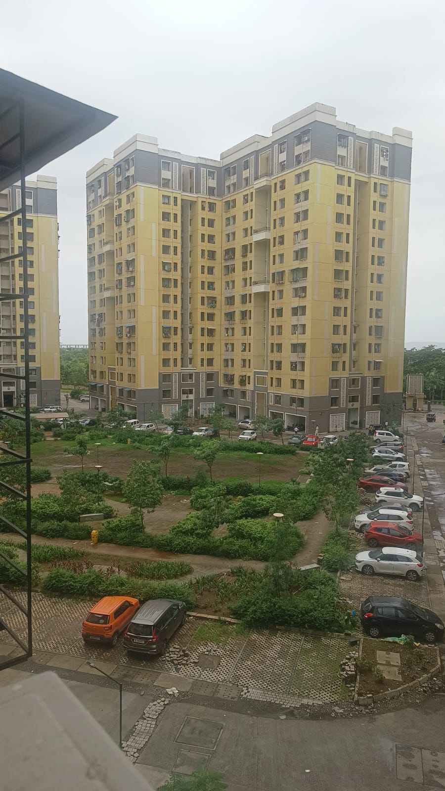 Ananta Towers Ulwe building exterior with yellow and grey elevation